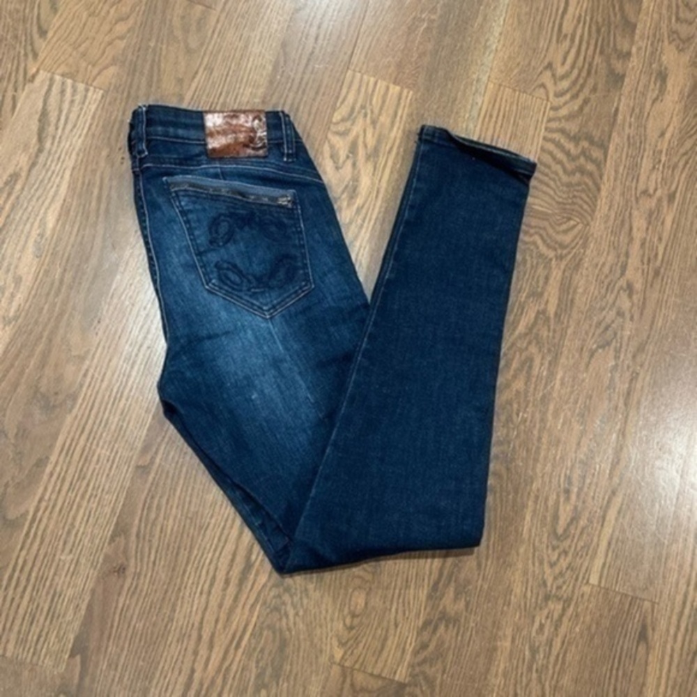 Vintage designer jeans size 28. Not sure the brand